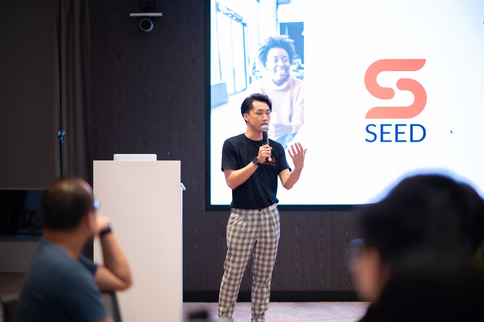 Sam Neo speaking at a SEED Academy event
